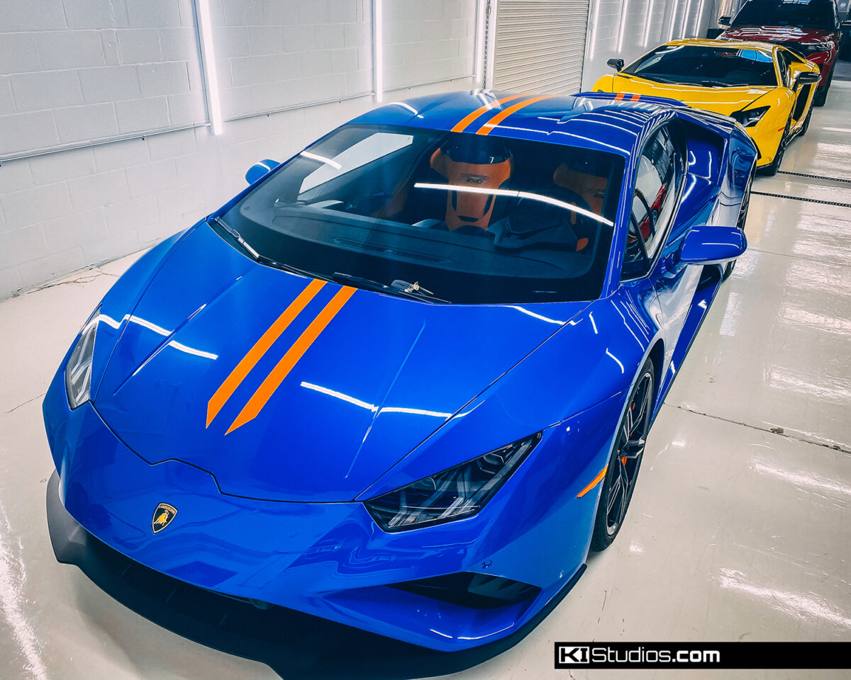 Blue Lamborghini Huracan with Orange Stripes