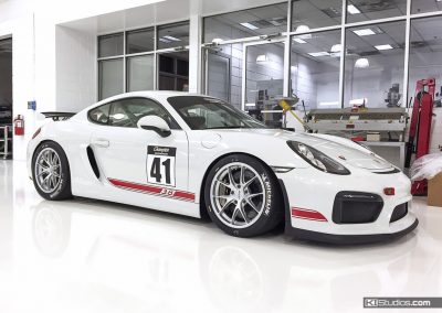Champion Porsche 981 Cayman with KI Studios Stripes